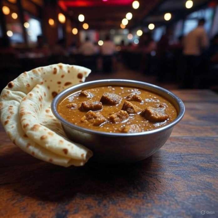 Steaming dal makhani with dumbbell paneer, half-torn roti. Steaming dal makhani with dumbbell paneer, half-torn roti.