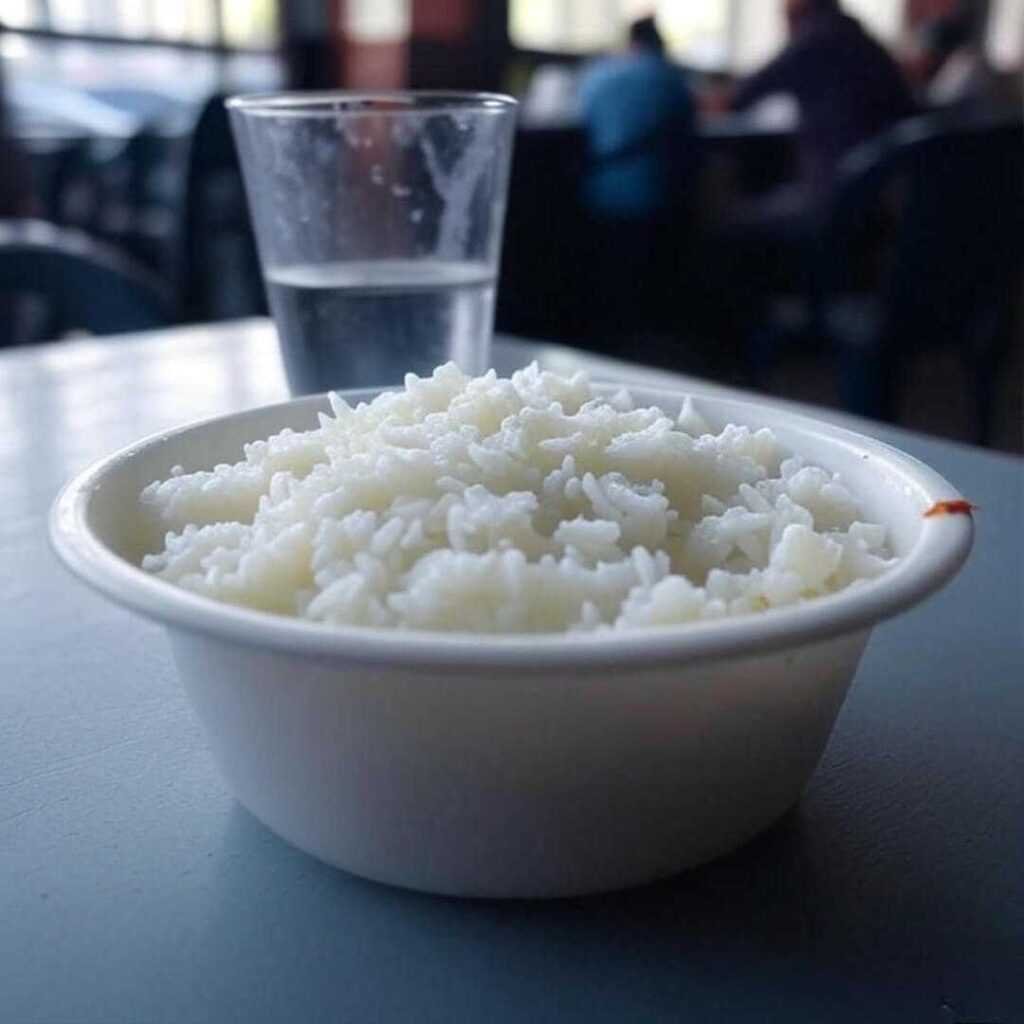 Shaky curd rice bowl, smudged glass, chili flake.