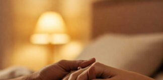 Supportive hands in soft light.